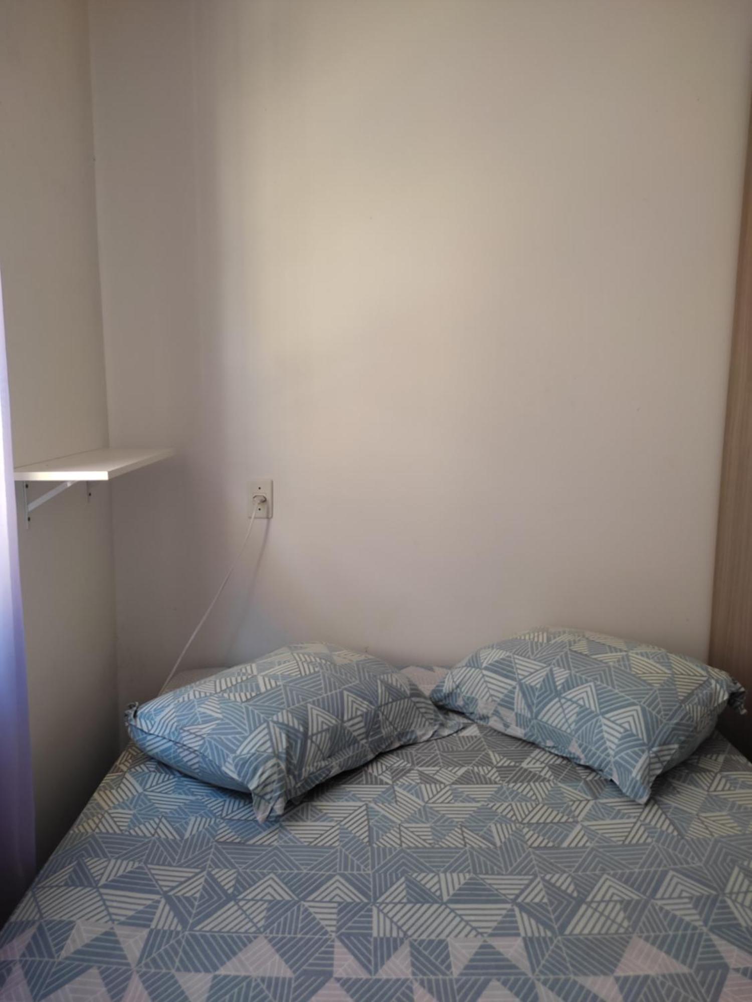 Um Quarto Em Casa Agradavel Pereque Luaran gambar
